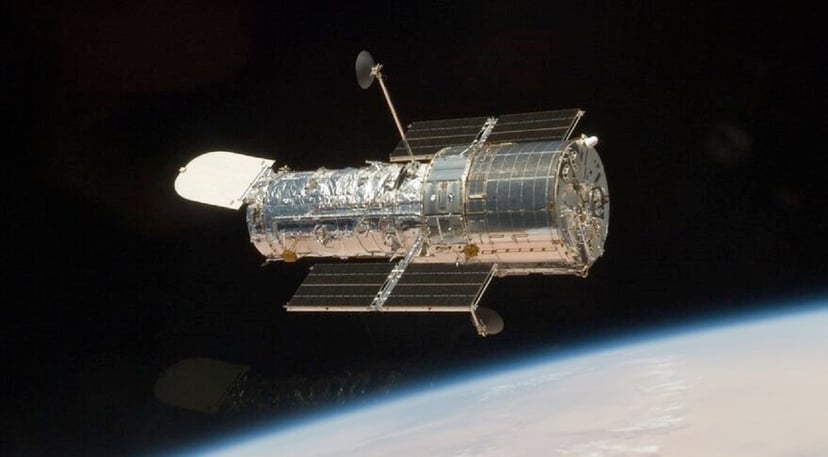 Galaktyka spiralna w obiektywie Hubble’a. Zaobserwował ją poszukując czarnych dziur