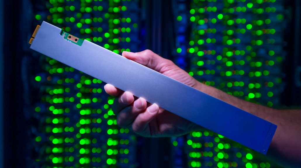 The ruler-shaped Intel SSD DC P4500 can hold up to 32 terabytes. It draws just one-tenth the power of a traditional spinning hard drive. (Credit: Walden Kirsch/Intel Corporation)
