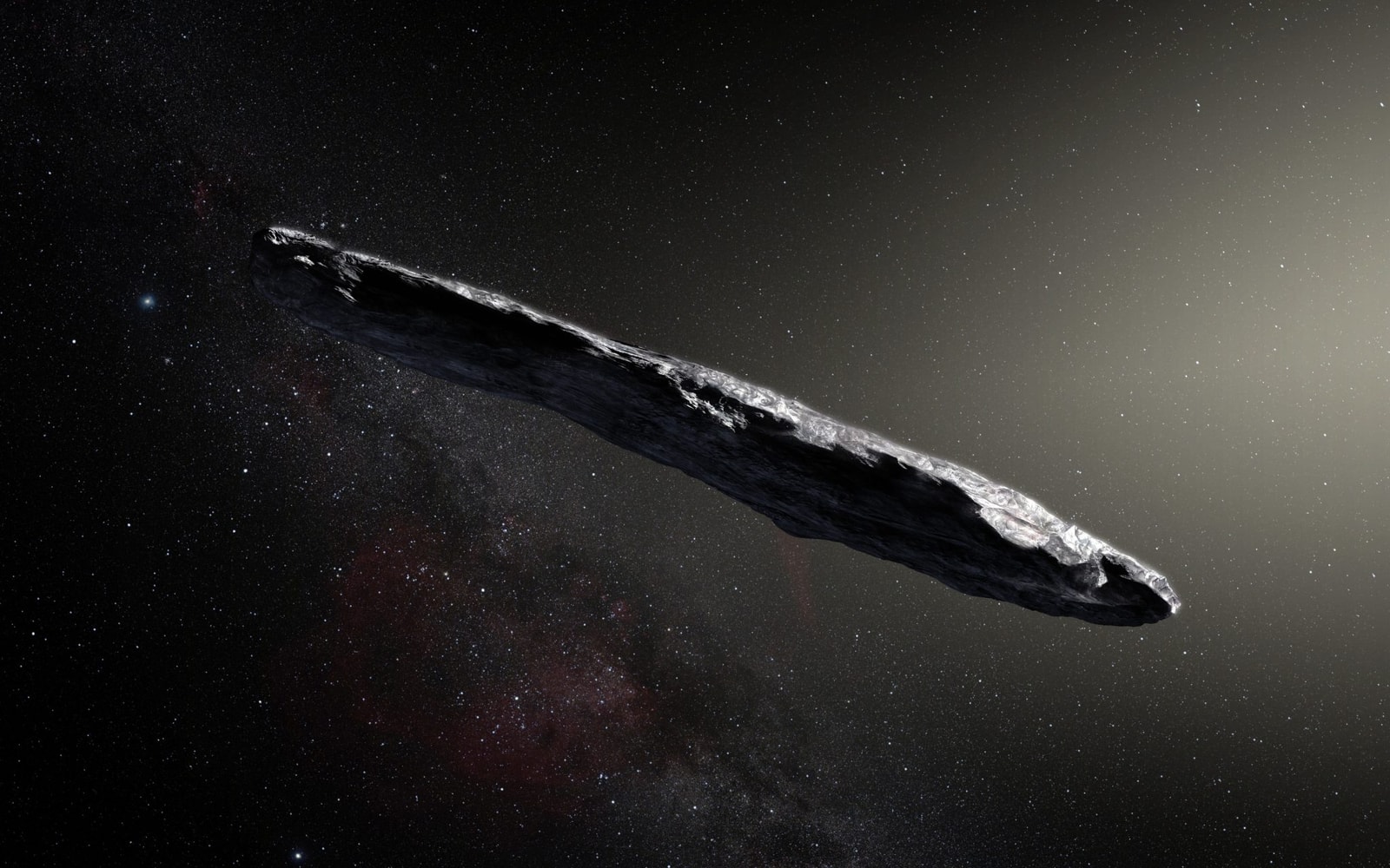 This artist’s impression shows the first interstellar asteroid: `Oumuamua. This unique object was discovered on 19 October 2017 by the Pan-STARRS 1 telescope in Hawai`i. Subsequent observations from ESO’s Very Large Telescope in Chile and other observatories around the world show that it was travelling through space for millions of years before its chance encounter with our star system. `Oumuamua seems to be a dark red highly-elongated metallic or rocky object, about 400 metres long, and is unlike anything normally found in the Solar System.
