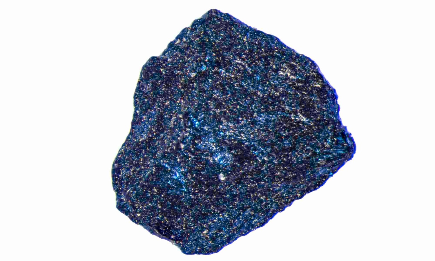 **FOCUS STACK OF 33 IMAGES, COLOR ENHANCED** An approximately 1mm diameter sample of lutetium hydride is pictured though a microscope in the lab of University of Rochester assistant professor of Mechanical Engineering and Physics and Astronomy Ranga Dias in Hopeman Hall December 15, 2022.  Dias uses the material in a high pressure diamond anvil cell (DAC) in his goal to create novel quantum materials such as superconductors with a critical temperature at or near room temperature.    // photo by J. Adam Fenster / University of Rochester
