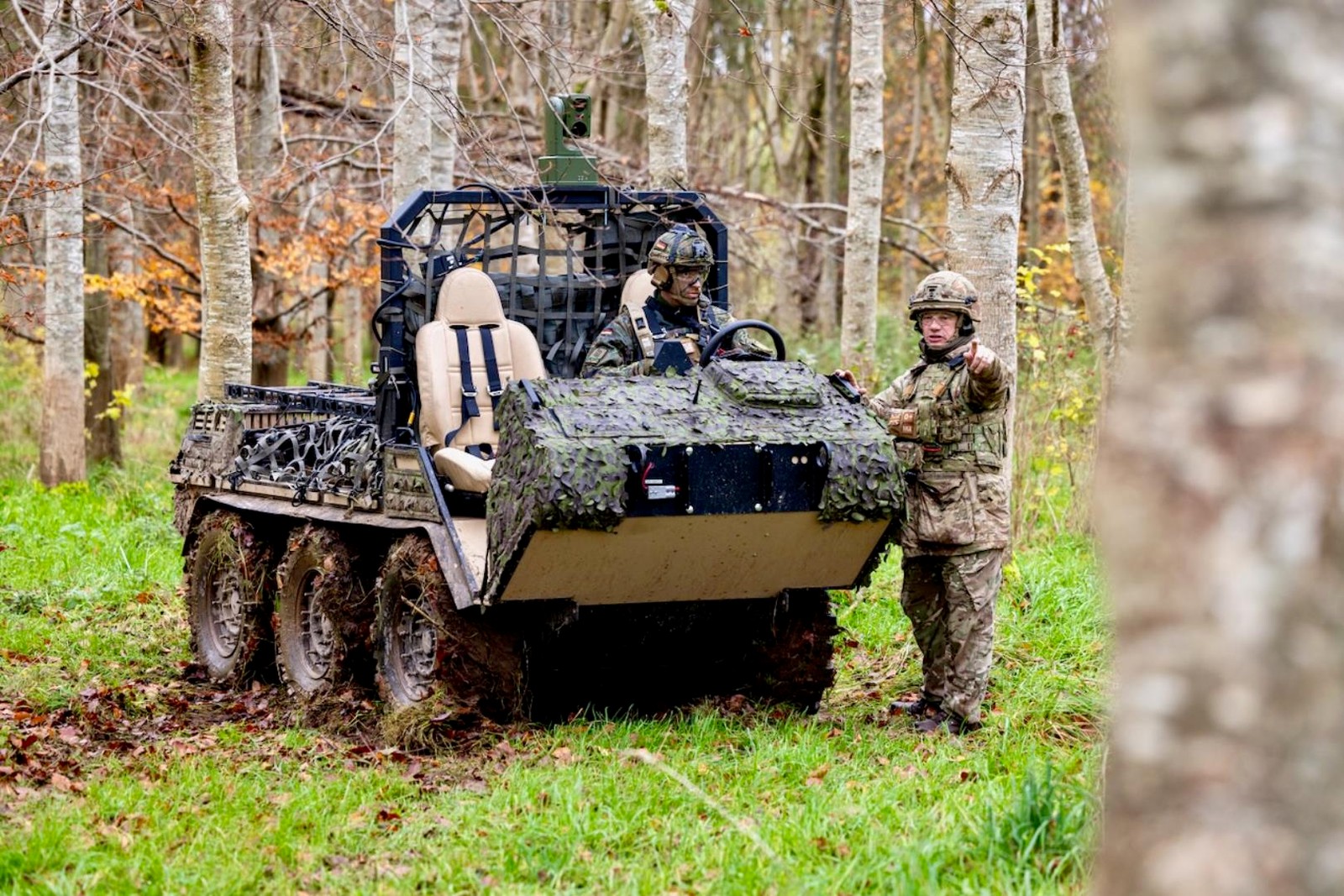 Working alongside each other British and German Service personnel test the HAWC vehicle which can be either driven or remotely piloted.
Soldiers from The Army Experimentation and Trials group have been deployed to Copehill Down on Salisbury Plain as a part of Exercise Blunting Strike in order to test potential new equipment for the Army.
Soldiers from The British Army were working alongside soldiers from the USA, France, Italy, Germany and Spain to develop both an understanding of new equipment as well as potential ways of integrating and working together with international partners.
Industry partners have developed pieces of equipment to provide potential solutions to Army activity and were on hand, working together with the troops, to develop and learn the ways the equipment could be used as well as current limitations.
Ex Blunting Strike is an important Army experimentation activity as a part of the Army Warfare Experiment (AWE). The British Army intends to accelerate transformation under Future Solider by engaging effectively with Industry to present its hypothesis to seek potential solutions from emerging technologies to inform future capability development.
 AWE Level C is the third stage of the AWE process. Level A centres around a Dragon’s Den type scenario where Industry answer a specific problem set articulated by The British Army. In this iteration Industry providers have been asked to provide solutions to Urban warfare problems such as countering drones and providing medevac in built up areas. Level B was the safety testing phase and Level C sees the equipment now in the hands of soldiers for user testing and experimentation.
