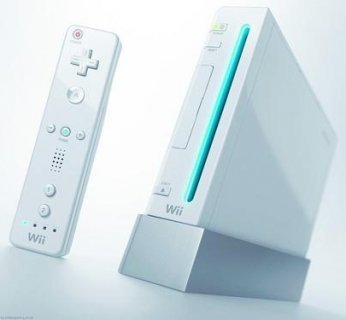 Również konsole do gier takie jak Nintendo Wii oferują możliwość konfiguracji sieciowej za pomocą przyciśnięcia jednego guzika. Info: www.nintendo.com, cena: ok. 700 zł