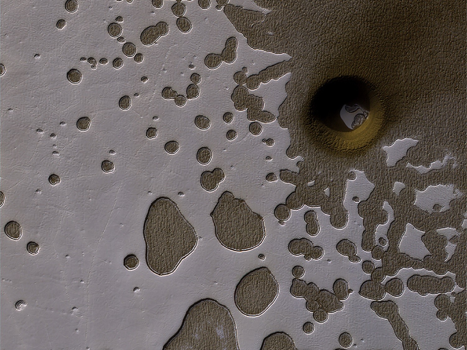 Mars dziurawy jak ser szwajcarski. Te struktury mówią nam wiele o Czerwonej Planecie