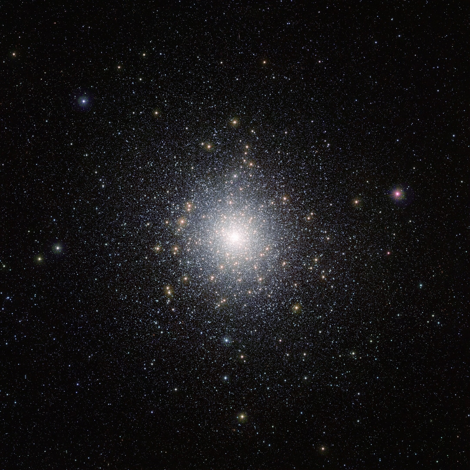 This bright cluster of stars is 47 Tucanae (NGC 104), shown here in an image taken by ESO’s VISTA (Visible and Infrared Survey Telescope for Astronomy) from the Paranal Observatory in Chile. This cluster is located around 15 000 light-years away from us and contains millions of stars, some of which are unusual and exotic. This image was taken as part of the VISTA Magellanic Cloud survey, a project that is scanning the region of the Magellanic Clouds, two small galaxies that are very close to our Milky Way.